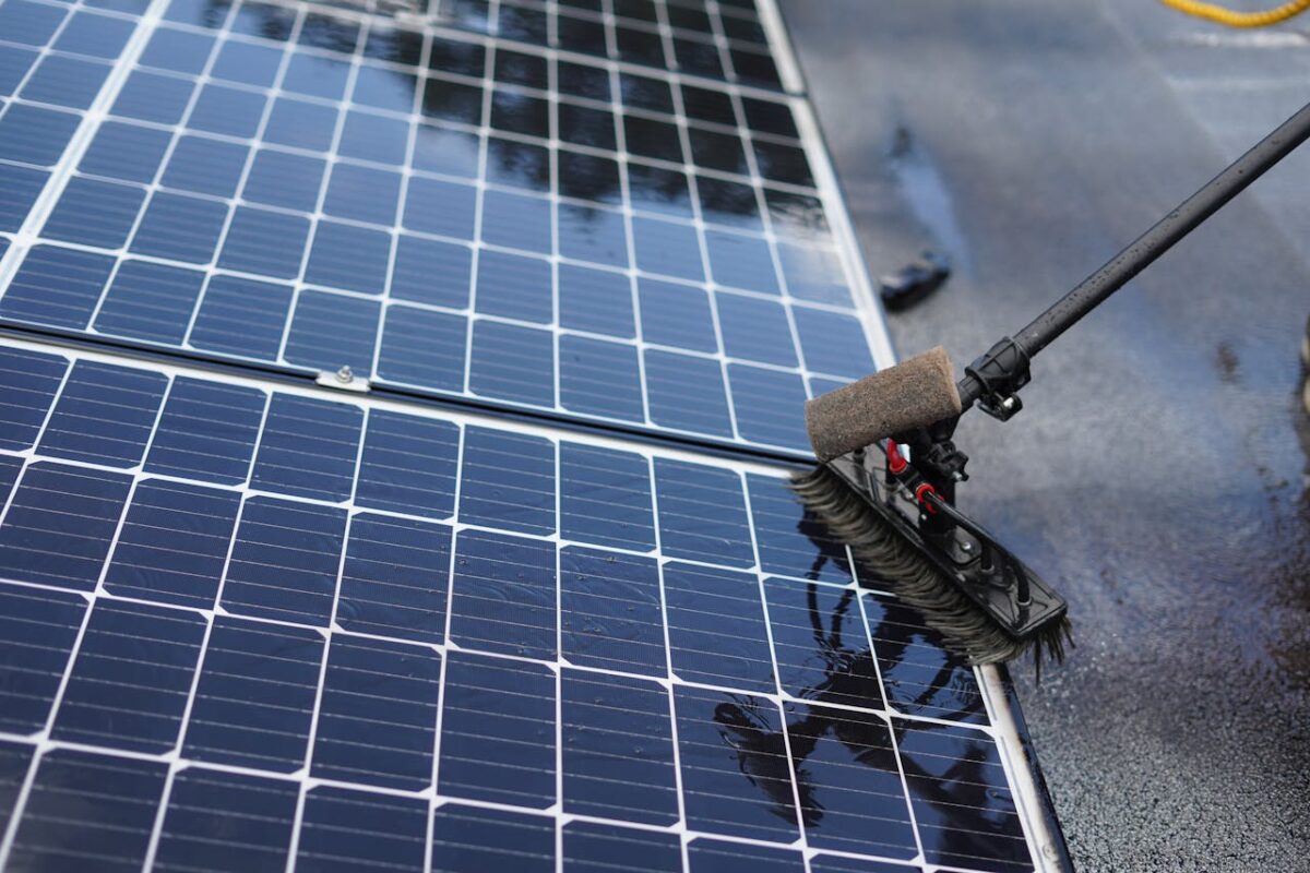 mission-02 Close-up of solar panel cleaning using a brush tool in Tampa, Florida.