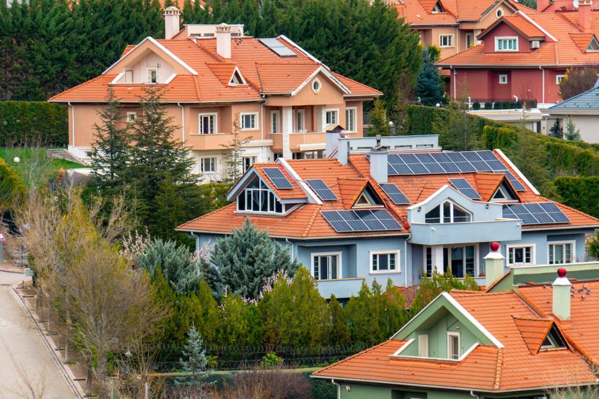 about-07 Beautiful homes in Ankara with solar panels, showcasing eco-friendly architecture surrounded by lush gardens.